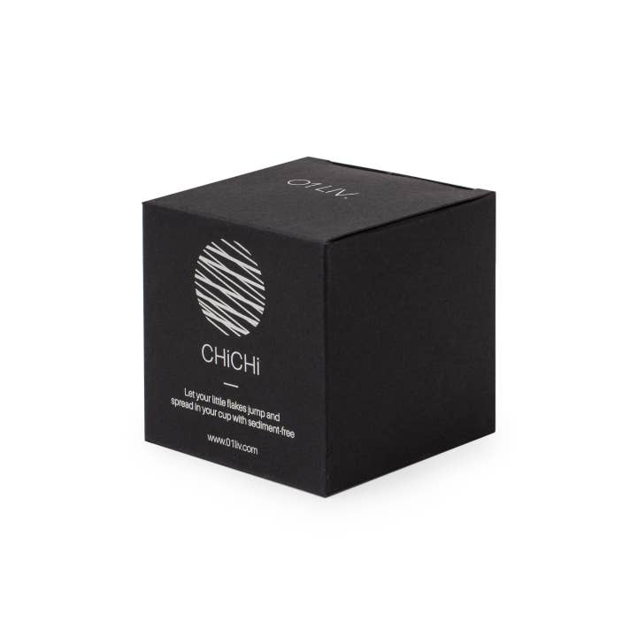 01Living's black tea ball infuser box with elegant silver line-art illustration of circle patterning, featuring the text 'ChiChi' and 'Oliv.' on a plain white background.