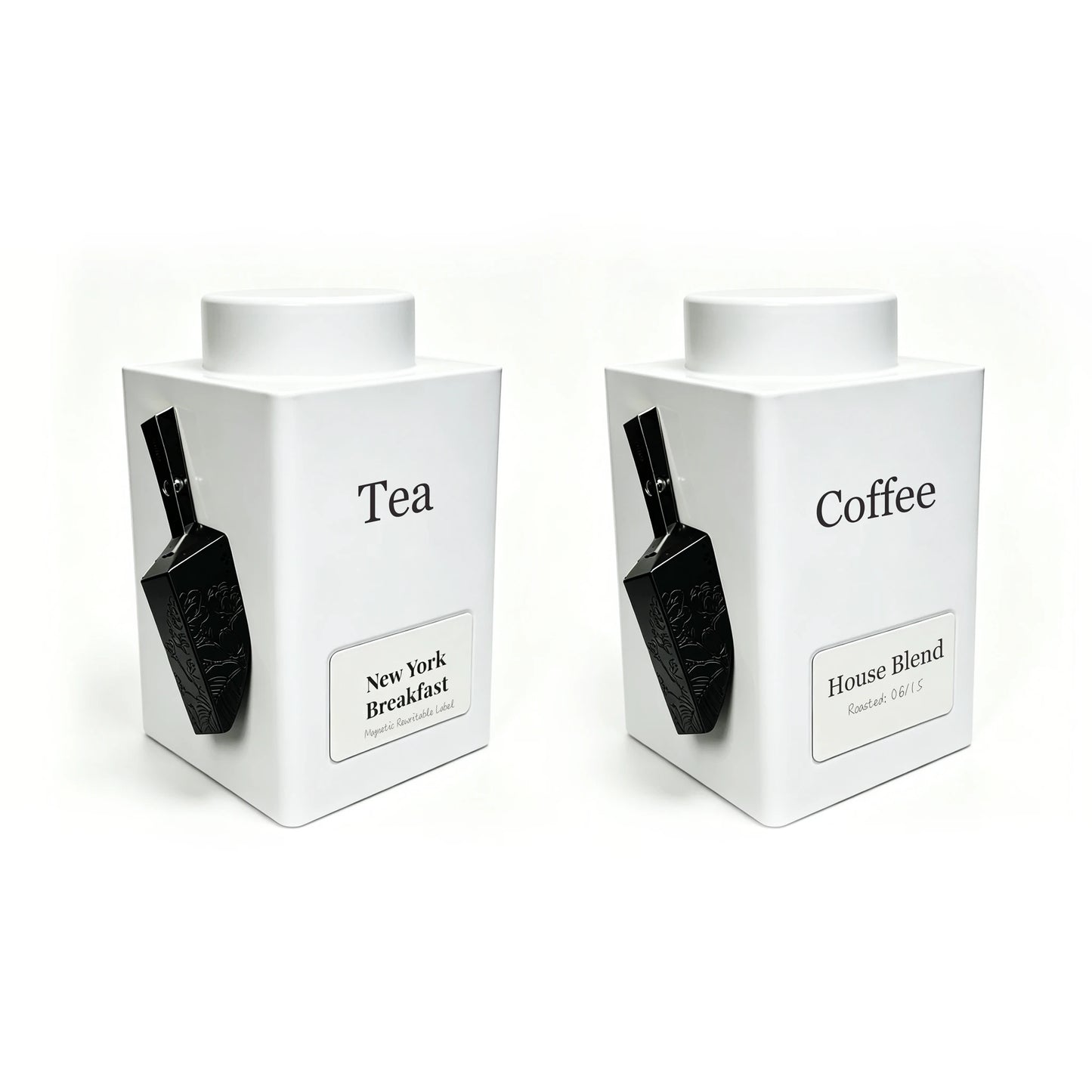 White Tea & Coffee Canister labelled “Tea”  & "Coffee" with a Black Magnetic Magic-Scoop™ attached to each tin, designed for organised loose-leaf tea storage.