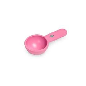 Pink measuring perfect cup spoon on a white background