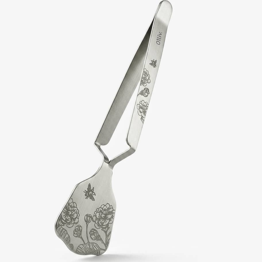 TenderPress™ Gentle Tea Bag Squeezer in polished silver stainless steel, designed to gently squeeze tea bags while keeping hands clean and reducing drips.