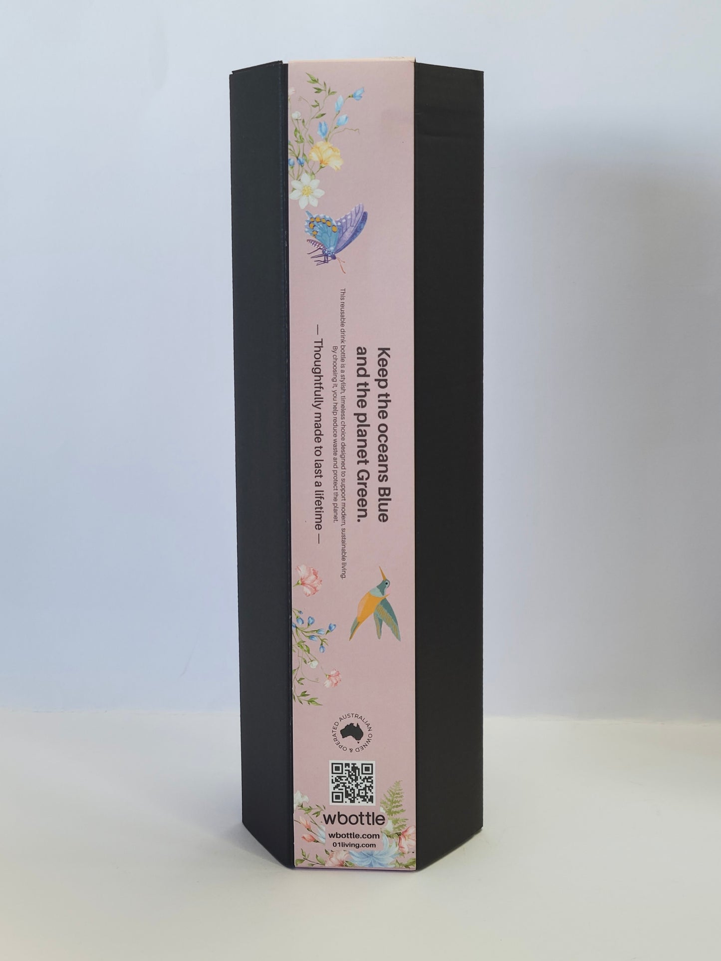 Back view of Pink Hummingbird Thermal Tea Flask 500ml / 17oz retail packaging, displaying product features and information for the reusable insulated tea bottle.