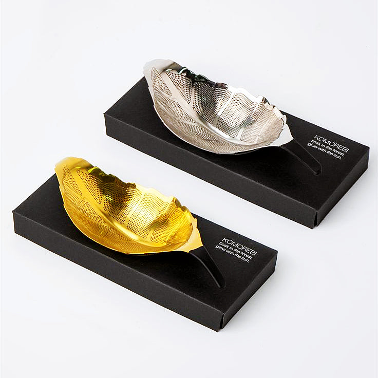 Silver & Gold Yezi™ Leaf Tea Strainer in leaf-shaped modern design, made from 304 stainless steel for filtering loose-leaf tea and sediment while pouring.