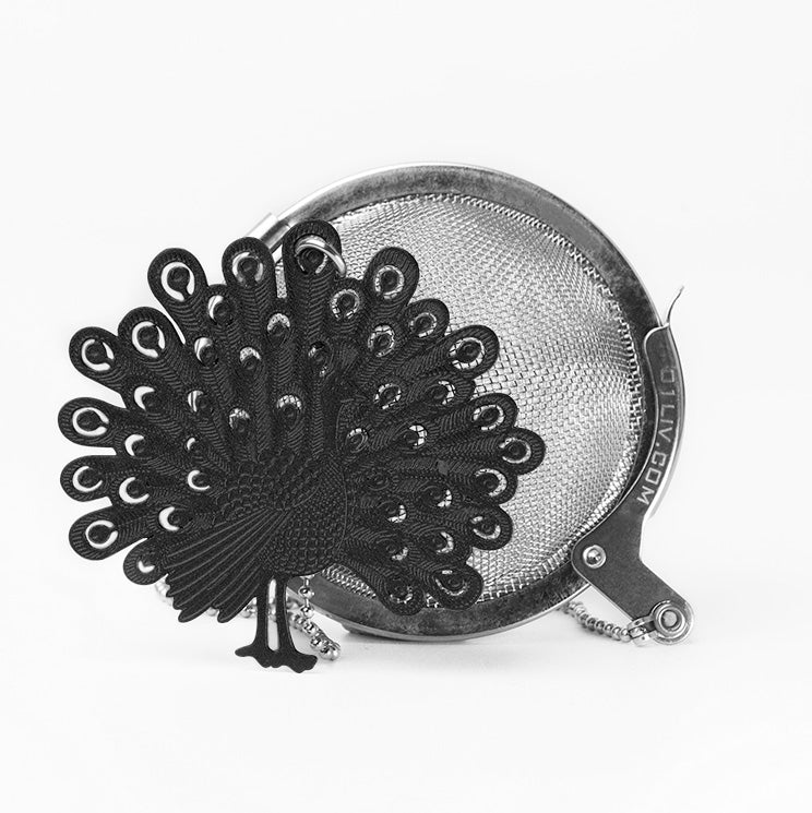 Loose Leaf Tea Ball Infuser crafted from 304 food-grade stainless steel with fine mesh, attached chain and decorative Peacock charm for easy loose-leaf tea brewing.